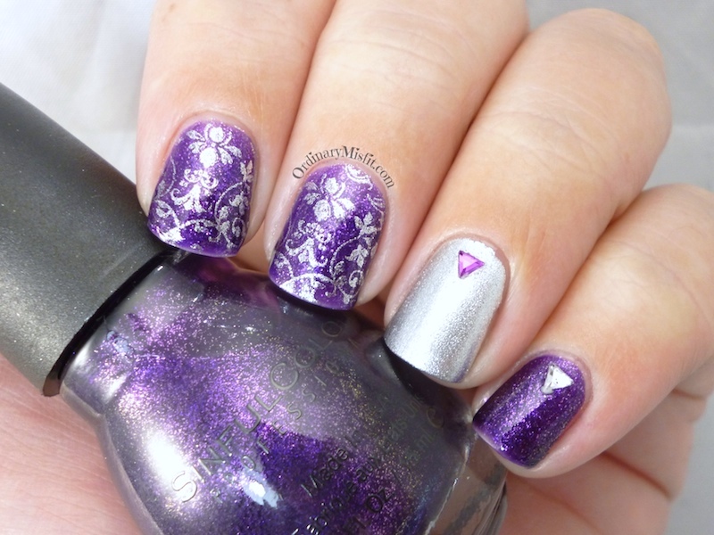 Purple glitter and silver nail art