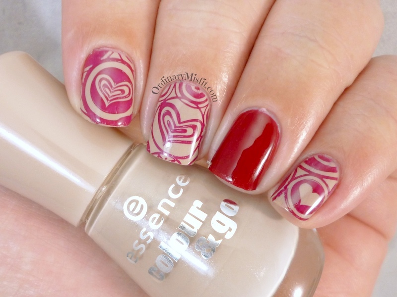 Red on nude stamped nail art
