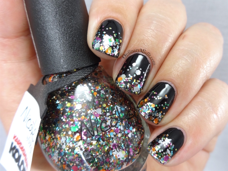 Black and glitter gradient nail art